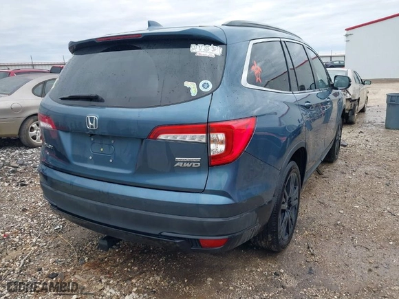 2021 Honda Pilot Special Edition with VIN 5FNYF6H28MB071142, listed as a IAAI auction lot 41531045 with 109,008 mi miles. Bid and sale history available at carsss.com. Image 4.