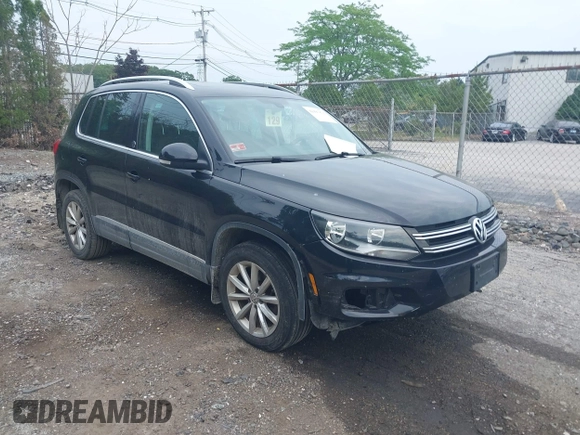 2017 Volkswagen Tiguan Wolfsburg Edition with VIN WVGSV7AX3HK037795, listed as a IAAI auction lot 42497812 with 86,211 mi miles and . Bid and sale history available at DreamBid. Image 1.