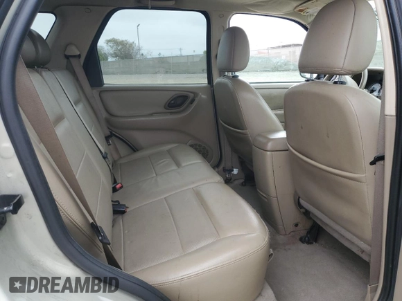 2005 Ford Escape Limited z VIN 1FMYU04195KB37679, wystawiony jako Copart lot #50656585 z przebiegiem 218 891 mil mil oraz Szkoda całkowita • Salvage title. Historia ofert i sprzedaży dostępna na DreamBid. Obrazek 11.