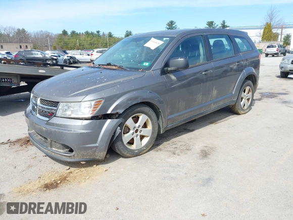2013 Dodge Journey SE Plus with VIN 3C4PDCAB9DT582144, listed as a IAAI auction lot 41964828 with 171,398 mi miles and . Bid and sale history available at DreamBid. Image 2.