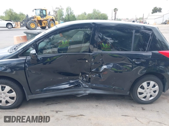 2009 Nissan Versa 1.8 S with VIN 3N1BC13E59L498728, listed as a IAAI auction lot 42110714 with 158,811 mi miles. Bid and sale history available at carsss.com. Image 12.