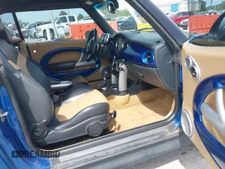 2006 MINI Convertible S with VIN WMWRH335X6TK59110, listed as a IAAI auction lot 42089085 with 101,303 mi miles and . Bid and sale history available at DreamBid. Image 5.