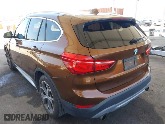 2017 BMW X1 xDrive28i with VIN WBXHT3C34H5F75885, listed as a IAAI auction lot 42655580 with 54,609 mi miles and . Bid and sale history available at DreamBid. Image 3.