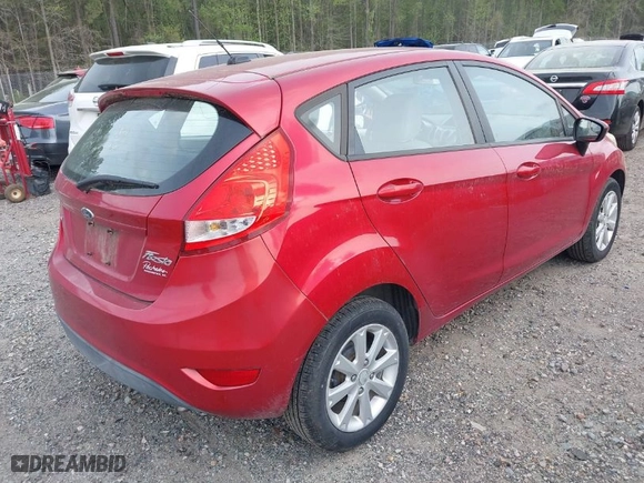 2011 Ford Fiesta SE with VIN 3FADP4EJ6BM128965, listed as a IAAI auction lot 41932743 with 123,057 mi miles. Bid and sale history available at carsss.com. Image 4.