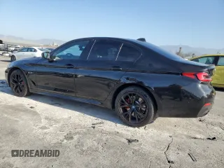 2023 BMW 5 Series 530e with VIN WBA13AG06PCM01727, listed as a Copart auction lot 83666424 with 40,831 mi miles and Salvage title. Bid and sale history available at DreamBid. Image 2.