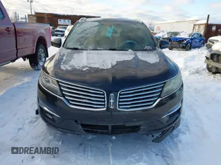 2015 Lincoln MKC with VIN 5LMTJ2AHXFUJ01440, listed as a IAAI auction lot 41526975 with 104,280 mi miles. Bid and sale history available at carsss.com. Image 12.