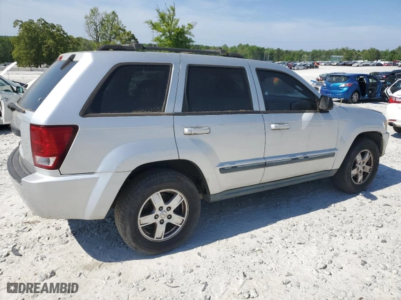 2007 Jeep Grand Cherokee Laredo with VIN 1J8GS48K07C595200, listed as a Copart auction lot 53964155 with 240,392 mi miles and Clean Title. Bid and sale history available at carsss.com. Image 3.
