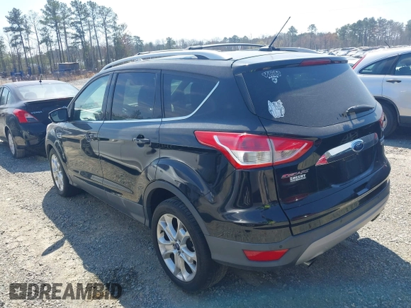 2016 Ford Escape Titanium with VIN 1FMCU0JX8GUC06601, listed as a IAAI auction lot 41785774 with 121,427 mi miles. Bid and sale history available at carsss.com. Image 14.