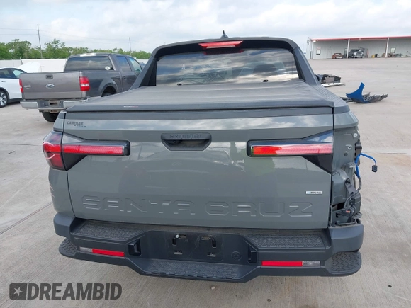 2022 Hyundai Santa Cruz SEL with VIN 5NTJBDAE4NH022823, listed as a IAAI auction lot 42051616 with 23,158 mi miles and . Bid and sale history available at DreamBid. Image 16.