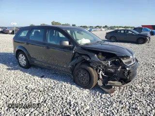 2015 Dodge Journey American Value with VIN 3C4PDCAB9FT692632, listed as a Copart auction lot 55261175 with 139,874 mi miles and Salvage Title. Bid and sale history available at DreamBid. Image 4.