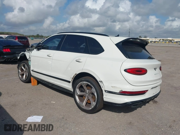 2022 Bentley Bentayga V8 z VIN SJAAM2ZV2NC013035, wystawiony jako IAAI lot #41487773 z przebiegiem 35 500 mil mil oraz . Historia ofert i sprzedaży dostępna na DreamBid. Obrazek 3.