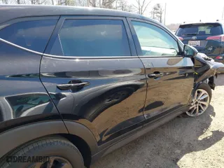 2018 Hyundai Tucson SE with VIN KM8J23A45JU603646, listed as a IAAI auction lot 41838097 with 64,704 mi miles. Bid and sale history available at carsss.com. Image 14.