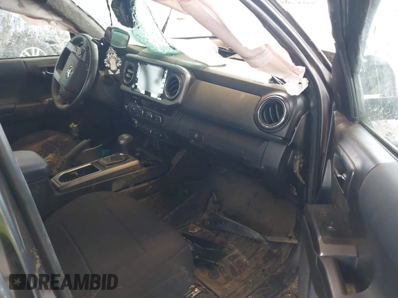 2022 Toyota Tacoma SR z VIN 3TMCZ5ANXNM493703, wystawiony jako IAAI lot #42139285 z przebiegiem 42 572 mil mil oraz . Historia ofert i sprzedaży dostępna na DreamBid. Obrazek 5.