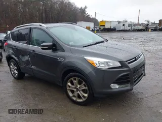 2015 Ford Escape Titanium with VIN 1FMCU9JX6FUB79093, listed as a IAAI auction lot 41805057 with 87,788 mi miles. Bid and sale history available at carsss.com. Image 1.