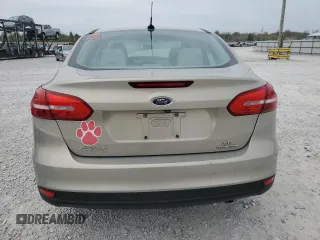 2016 Ford Focus SE z VIN 1FADP3F20GL267077, wystawiony jako Copart lot #53649665 z przebiegiem 106 329 mil mil oraz Szkoda całkowita • Salvage title. Historia ofert i sprzedaży dostępna na DreamBid. Obrazek 6.