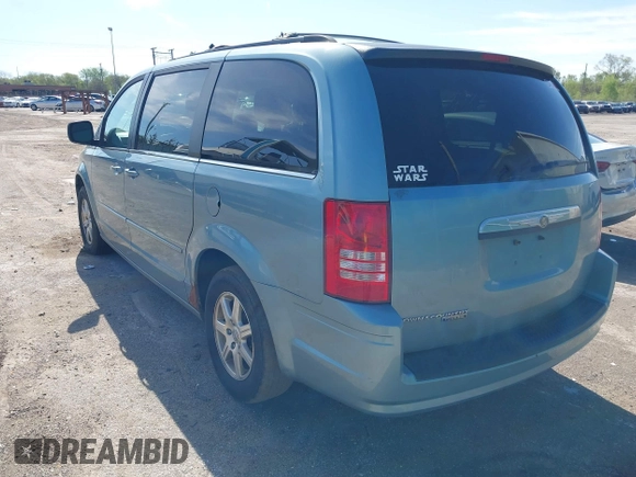 2008 Chrysler Town & Country Touring with VIN 2A8HR54P68R115192, listed as a IAAI auction lot 42141588 with 239,819 mi miles. Bid and sale history available at carsss.com. Image 3.