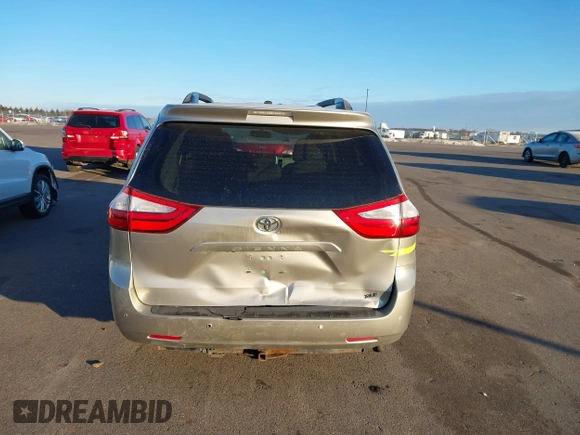 2016 Toyota Sienna XLE z VIN 5TDYK3DC8GS713481, wystawiony jako IAAI lot #41239824 z przebiegiem 176 935 mil mil oraz . Historia ofert i sprzedaży dostępna na DreamBid. Obrazek 17.