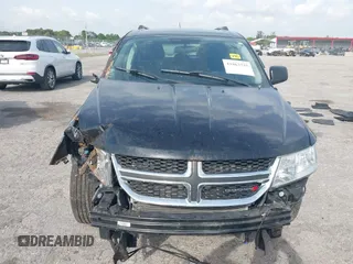 2017 Dodge Journey SE with VIN 3C4PDCAB4HT691343, listed as a IAAI auction lot 41863725 with 99,519 mi miles and . Bid and sale history available at carsss.com. Image 12.