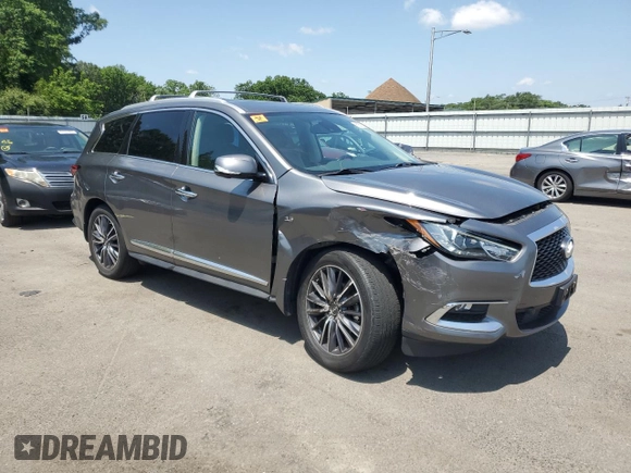 2019 Infiniti QX60 Luxe with VIN 5N1DL0MM1KC504950, listed as a Copart auction lot 61621525 with 95,199 mi miles and Salvage title. Bid and sale history available at DreamBid. Image 4.