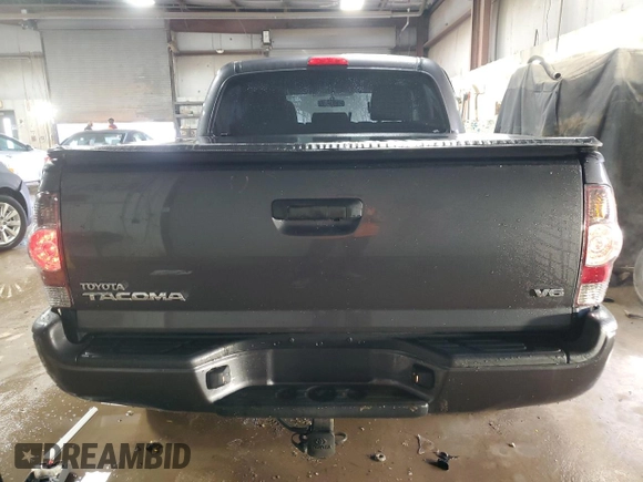 2014 Toyota Tacoma with VIN 5TFLU4ENXEX089927, listed as a Copart auction lot 52140565 with 112,924 mi miles and Salvage Title. Bid and sale history available at DreamBid. Image 6.