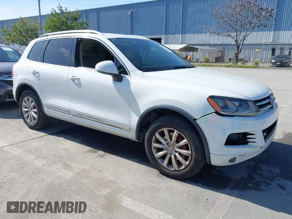 2012 Volkswagen Touareg Sport with VIN WVGEF9BP5CD007294, listed as a IAAI auction lot 41841268 with 160,883 mi miles and . Bid and sale history available at DreamBid. Image 1.