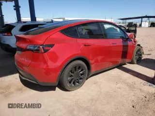 2022 Tesla Model Y Long Range z VIN 7SAYGDEE3NF436119, wystawiony jako Copart lot #54892115 z przebiegiem 27 054 mil mil oraz Szkody całkowita. Historia ofert i sprzedaży dostępna na DreamBid. Obrazek 3.