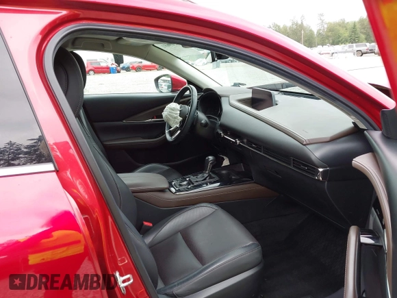 2021 Mazda CX-30 Premium with VIN 3MVDMBDM7MM213754, listed as a IAAI auction lot 42509691 with 61,230 mi miles and . Bid and sale history available at DreamBid. Image 5.
