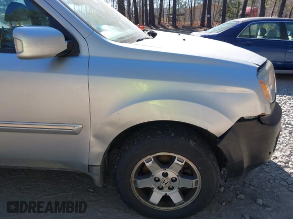 2010 Honda Pilot Touring with VIN 5FNYF4H91AB020868, listed as a IAAI auction lot 41783104 with 298,022 mi miles and . Bid and sale history available at carsss.com. Image 18.