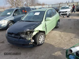 2009 Hyundai Accent Auto SE with VIN KMHCN36C69U112207, listed as a IAAI auction lot 41641298 with 166,804 mi miles. Bid and sale history available at carsss.com. Image 2.