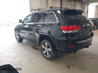 2014 Jeep Grand Cherokee Overland with VIN 1C4RJFCM4EC386398, listed as a IAAI auction lot 41696113 with 119,110 mi miles. Bid and sale history available at carsss.com. Image 3.