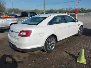 2010 Ford Taurus Limited with VIN 1FAHP2FWXAG112342, listed as a IAAI auction lot 42005142 with 148,947 mi miles. Bid and sale history available at carsss.com. Image 4.