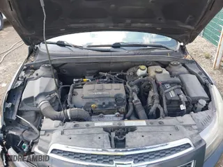 2014 Chevrolet Cruze 1LT with VIN 1G1PC5SB6E7102220, listed as a IAAI auction lot 41936116 with 139,454 mi miles. Bid and sale history available at carsss.com. Image 10.