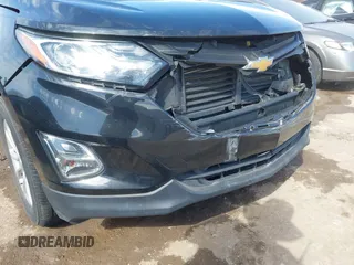2019 Chevrolet Equinox LT z VIN 3GNAXUEV0KL216360, wystawiony jako IAAI lot #41664268 z przebiegiem 69 411 mil mil oraz . Historia ofert i sprzedaży dostępna na DreamBid. Obrazek 6.