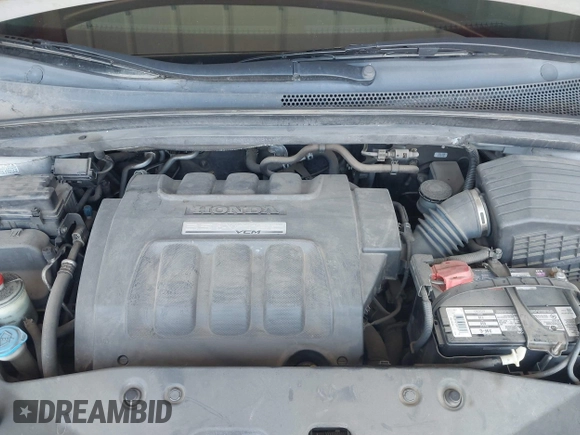 2005 Honda Odyssey EX-L with VIN 5FNRL38705B106488, listed as a IAAI auction lot 42545141 with 199,619 mi miles and . Bid and sale history available at DreamBid. Image 10.