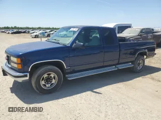 1995 GMC Sierra 1500 z VIN 1GTGC29NXSE514234, wystawiony jako Copart lot #60367145 z przebiegiem 140 371 mil mil oraz Czysty tytuł • Clean title. Historia ofert i sprzedaży dostępna na DreamBid. Obrazek 1.