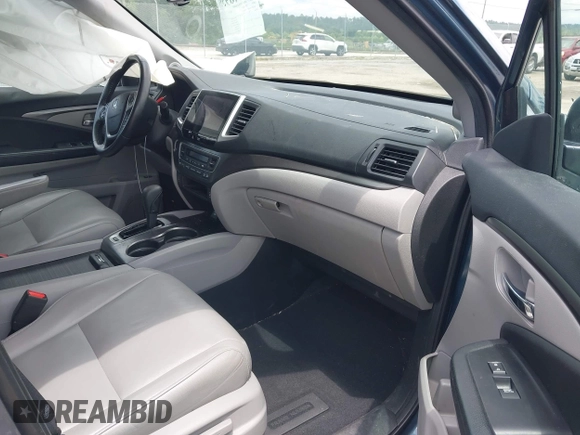 2018 Honda Pilot EX-L with VIN 5FNYF6H53JB006219, listed as a IAAI auction lot 42469399 with 134,214 mi miles and . Bid and sale history available at DreamBid. Image 5.