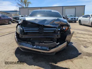2015 Volkswagen Passat SE with VIN 1VWBS7A35FC014128, listed as a Copart auction lot 51010485 with 154,263 mi miles and Salvage title. Bid and sale history available at DreamBid. Image 5.