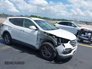 2017 Hyundai Santa Fe 2.4L z VIN 5NMZU3LB9HH034850, wystawiony jako IAAI lot #42342054 z przebiegiem 192 154 mil mil oraz . Historia ofert i sprzedaży dostępna na DreamBid. Obrazek 1.