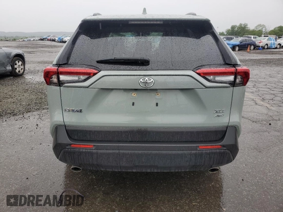 2021 Toyota RAV4 XLE Premium with VIN JTMA1RFV0MD074834, listed as a Copart auction lot 58466965 with 71,623 mi miles and Salvage title. Bid and sale history available at DreamBid. Image 6.