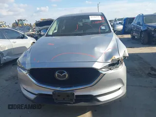 2020 Mazda CX-5 Touring with VIN JM3KFACMXL1786200, listed as a IAAI auction lot 41506139 with 121,944 mi miles. Bid and sale history available at carsss.com. Image 13.