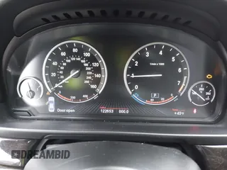 2013 BMW 5 Series 528i xDrive with VIN WBAXH5C54DDW13438, listed as a IAAI auction lot 41851954 with 122,653 mi miles. Bid and sale history available at carsss.com. Image 7.
