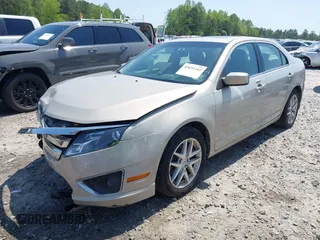 2010 Ford Fusion SEL with VIN 3FAHP0JG6AR282999, listed as a IAAI auction lot 42031162 with 128,001 mi miles and . Bid and sale history available at DreamBid. Image 2.