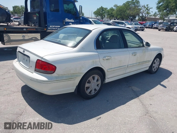 2005 Hyundai Sonata GL with VIN KMHWF25S65A131588, listed as a IAAI auction lot 41934026 with 129,886 mi miles. Bid and sale history available at carsss.com. Image 4.