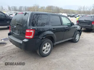 2009 Ford Escape XLS z VIN 1FMCU02759KA61417, wystawiony jako IAAI lot #42102452 z przebiegiem 207 262 mil mil oraz . Historia ofert i sprzedaży dostępna na DreamBid. Obrazek 4.