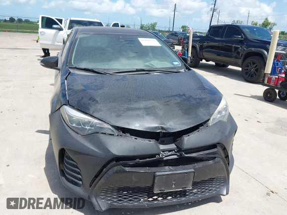 2017 Toyota Corolla L with VIN 5YFBURHE9HP576513, listed as a IAAI auction lot 42460720 with 217,852 mi miles and . Bid and sale history available at DreamBid. Image 12.