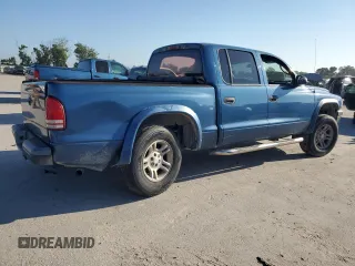 2004 Dodge Dakota Sport with VIN 1D7HG38N14S770031, listed as a Copart auction lot 72001434 with 131,547 mi miles and Salvage Title. Bid and sale history available at DreamBid. Image 3.