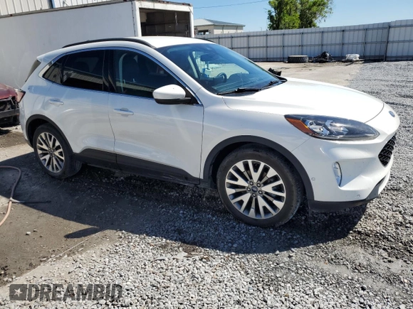 2021 Ford Escape Titanium Hybrid z VIN 1FMCU0DZ5MUB04522, wystawiony jako Copart lot #49127385 z przebiegiem 66 996 mil mil oraz Szkody całkowita. Historia ofert i sprzedaży dostępna na DreamBid. Obrazek 4.