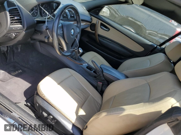 2008 BMW 1 Series 128i with VIN WBAUN13508VH77566, listed as a Copart auction lot 49605155 with 66,885 mi miles and Salvage Title. Bid and sale history available at DreamBid. Image 7.