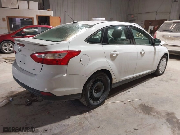 2012 Ford Focus SE with VIN 1FAHP3F24CL313957, listed as a IAAI auction lot 41368553 with 113,610 mi miles. Bid and sale history available at carsss.com. Image 4.