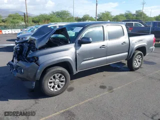 2016 Toyota Tacoma SR5 with VIN 5TFAX5GN0GX065186, listed as a IAAI auction lot 41468194 with 124,593 mi miles. Bid and sale history available at carsss.com. Image 18.